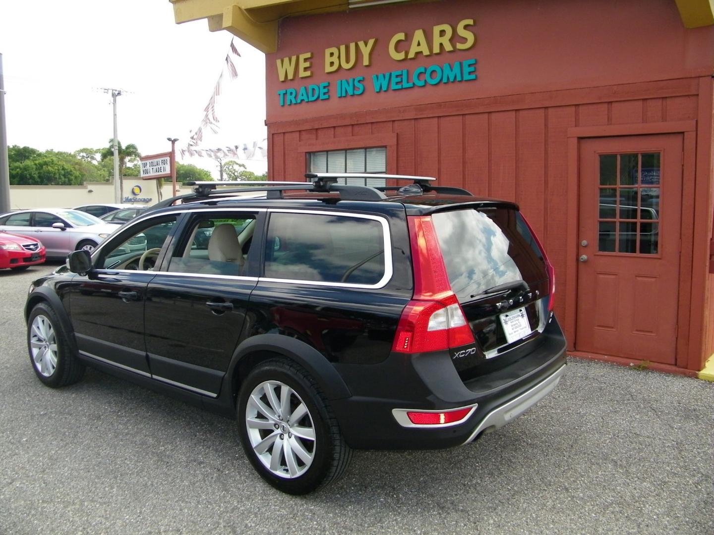 2011 Black /Beige Volvo XC70 T6 AWD (YV4902BZ9B1) with an 3.2L L6 DOHC 24V engine, 6-Speed Automatic transmission, located at 4000 Bee Ridge Road, Sarasota, FL, 34233, (941) 926-0300, 27.298664, -82.489151 - Photo#3